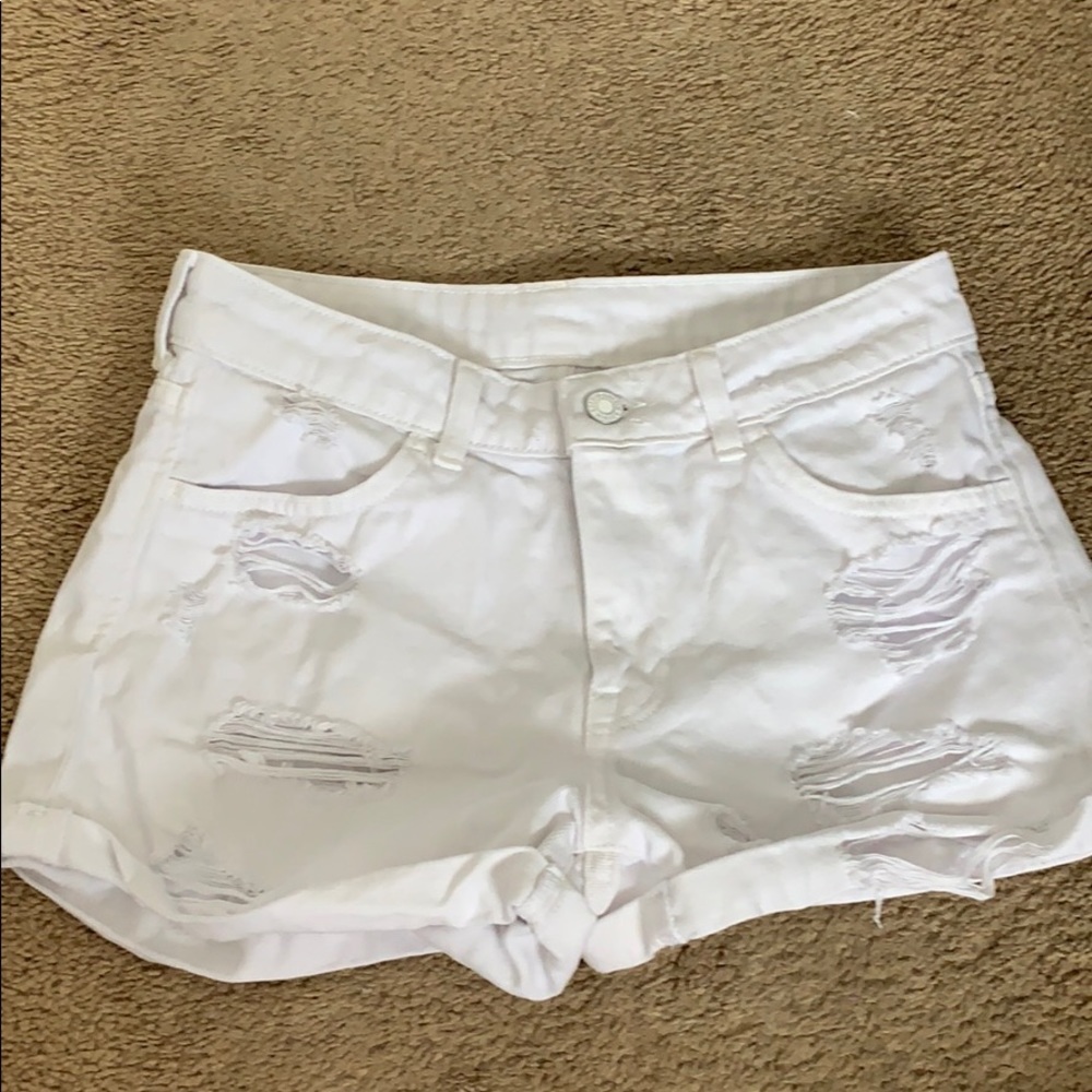 White ripped jean shorts